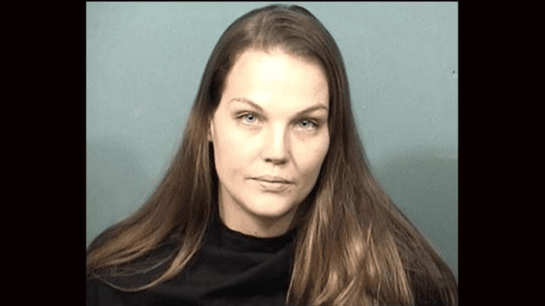 Mom leaves 8 month and 2 year old in car while in bar