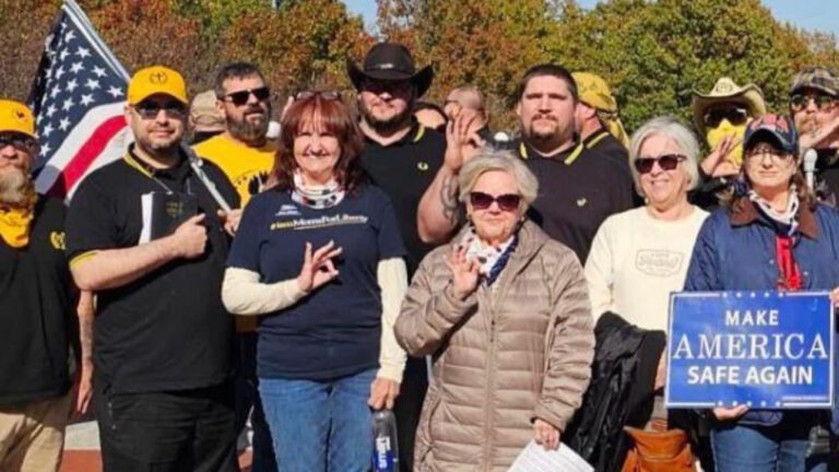 Moms for Liberty Leadership poses with Proud Boys and flashes “White Power” sign