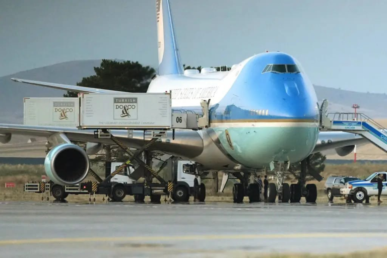Air Force One on the tarmac, the presidential aircraft press and staff flew aboard while President Trump was secretly moved to a smaller jet during an Iran threat